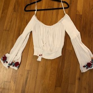 Bohemian off the shoulder long sleeve flared top!